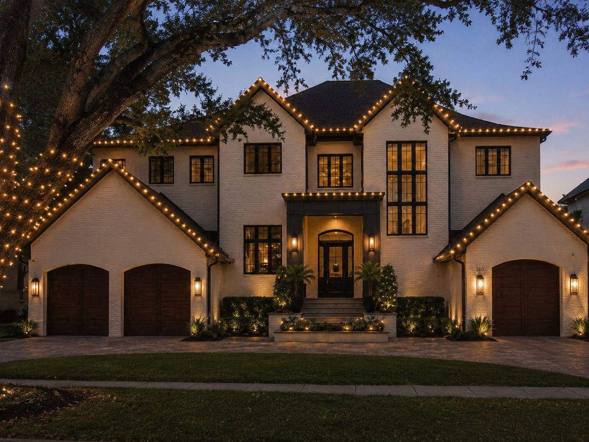 Holiday roofline lighting under mature oak trees, Carrollwood FL